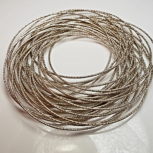 Silver tone multi hoop bracelet - Picture 1 of 2